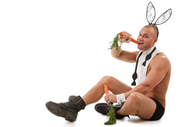 Lovely bunny  man  with carrots - Foto, Imagen