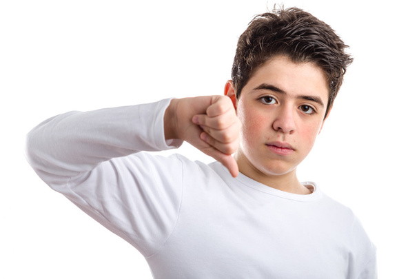 Dislike gesture by Caucasian teen with acne skin - Photo, Image