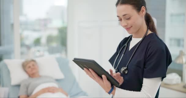 Nurse, tablet and checkup for patient in hospital for consultation for healthcare with therapist. Medical expert, results and tech for help at clinic for diagnosis or health professional for career - Footage, Video