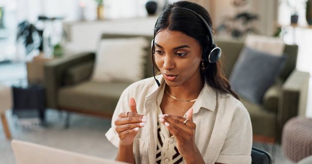 Woman, call center and headphones consulting in remote work, customer service or telemarketing at home office. Female person or consultant agent talking, explaining or online advice for help at house. - Photo, Image