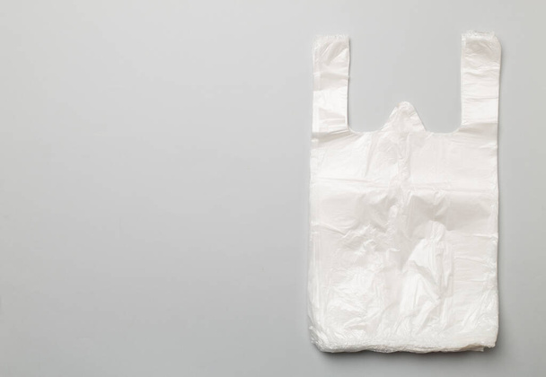 Plastic bag on color background, top view - Foto, immagini