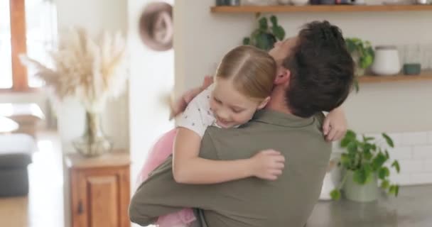 Care, love and father hug child or bonding in a kitchen together, excited and playing as a parent daughter relationship. Tutu, dad and man in a home happy with a kid for celebration and happiness. - Footage, Video
