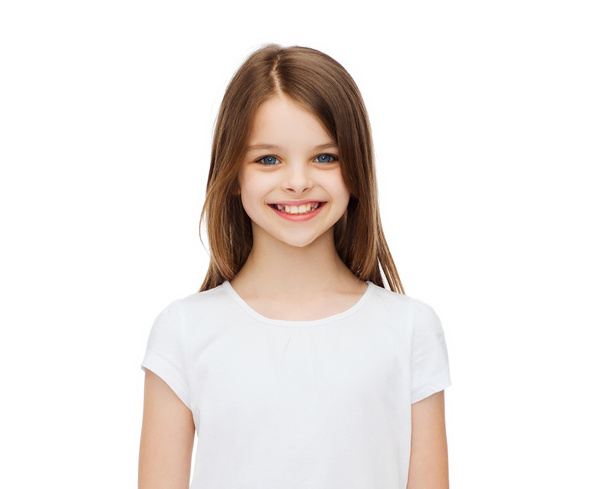 smiling little girl in white blank t-shirt - Fotó, kép
