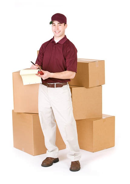 Shipping: Delivery Man Stands With Large Shipment - Foto, imagen
