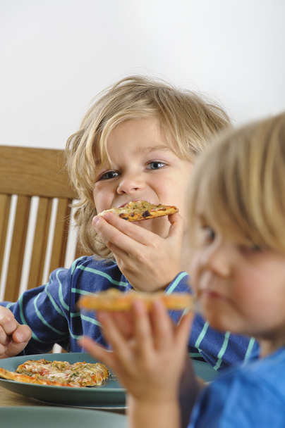 Syöminen Pizza - Valokuva, kuva