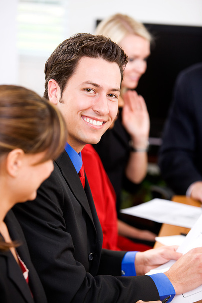 Business: Smiling Businessman During Meeting - Photo, Image