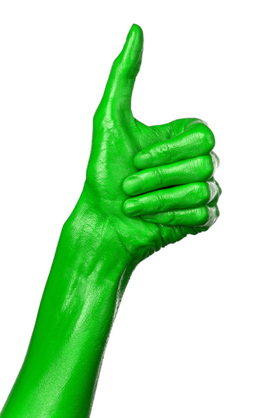 Mano verde sobre fondo blanco, aislado, pintura
 - Foto, imagen