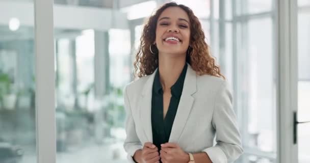 Face, happy and arms crossed with a business woman in the office, laughing at a joke while looking proud at work. Portrait, smile and a confident employee in suit standing in her corporate workplace. - Footage, Video