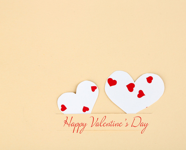 Paper hearts on beige background, close up - 写真・画像