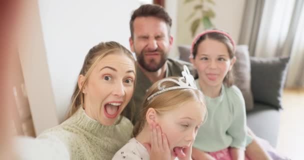 Funny, face and selfie of parents, kids and home for video call, profile picture or social media. Silly family, emoji or portrait of mom, dad and children in photograph, crazy memory or joke together. - Footage, Video