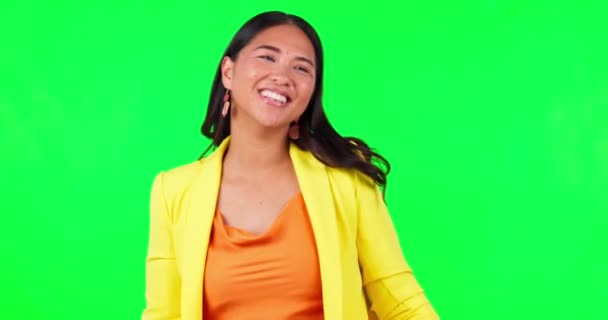 Happy asian woman, dancing and green screen for music, party or celebration against a studio background. Excited female person enjoying fun music, event or good vibes in happiness on mockup space. - Footage, Video