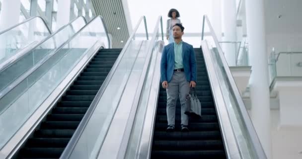 Time check, businessman and on escalator at work, late for appointment or reading notification. Airport trip, corporate travel and Asian man on a lift in an office building with a watch for a timer. - Footage, Video