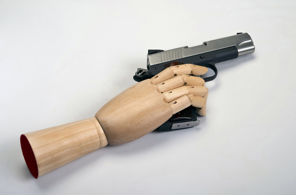45  caliber handgun. - Фото, изображение