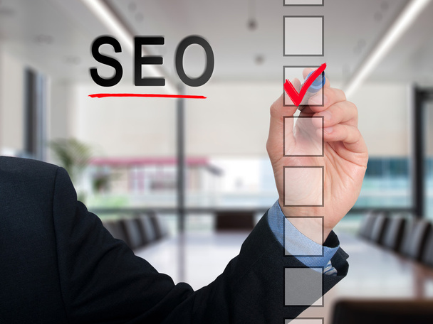 Businessman checking mark on SEO checklist marker. Checking SEO. Isolated on  background, Stock Photo - Fotoğraf, Görsel