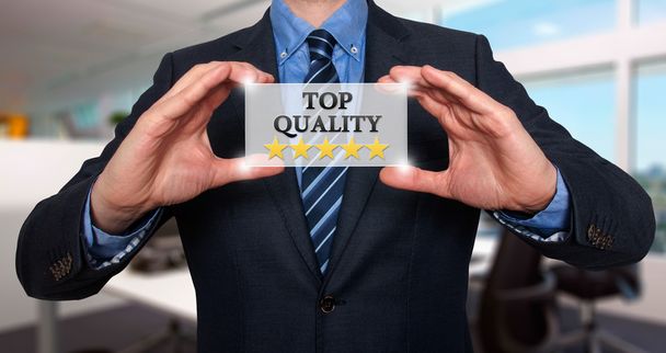 TOP Quality with five stars - Businessman with sign - Isolated on various background - Stock Photo - 写真・画像