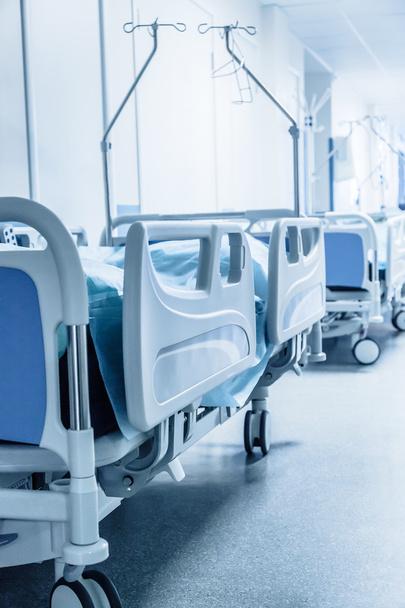 Long corridor in hospital with surgical beds. - Photo, image