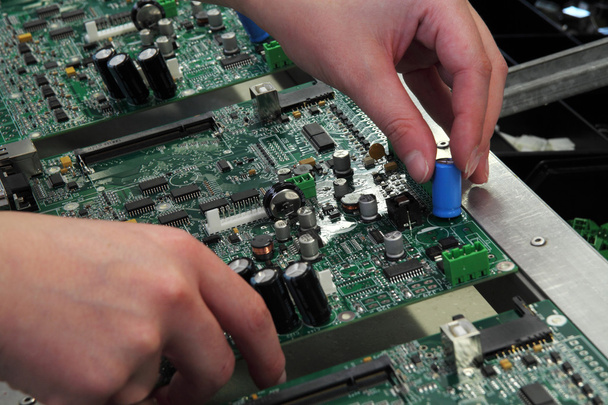 manual assembly of electronic components - Photo, Image