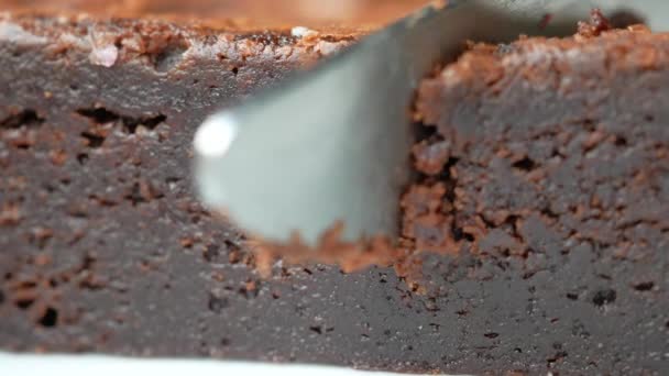 slice of brownie on plate on table . - Footage, Video
