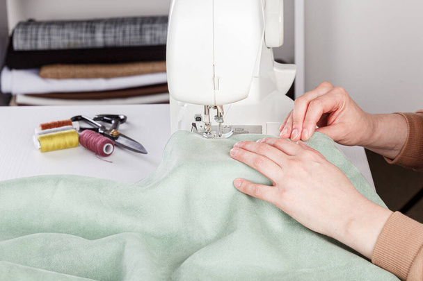 Sewing machine, stitching fabrics, needle in a round plan close up - Photo, Image