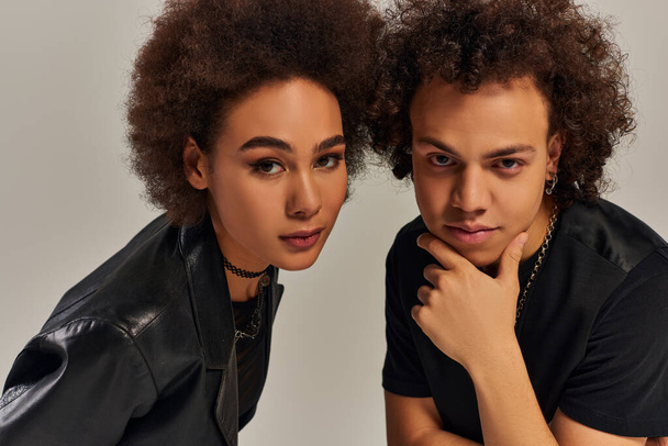 portrait of stylish african american siblings in urban outfits posing together, family concept - Photo, Image