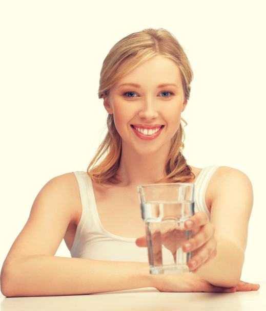 woman with glass of water - Фото, зображення