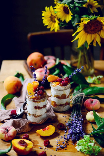 Rise pudding with peach compote.style rustic.selective focus - Photo, Image