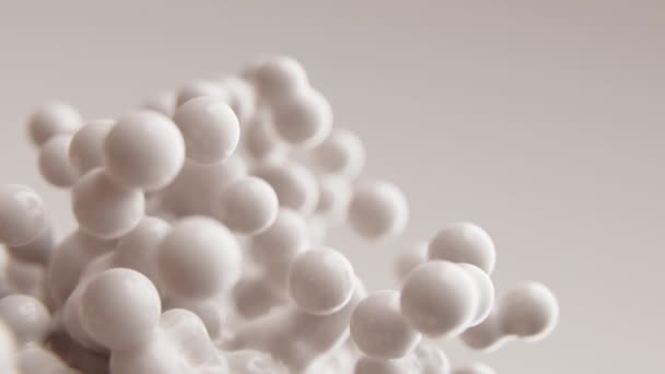 Abstrait 3D rendre animation au ralenti mouvement laiteux blanc orbes de lait mat fond animé métaboliques bulles particules bulles morphing molécules volantes papier peint présentation médicale toile de fond - Séquence, vidéo