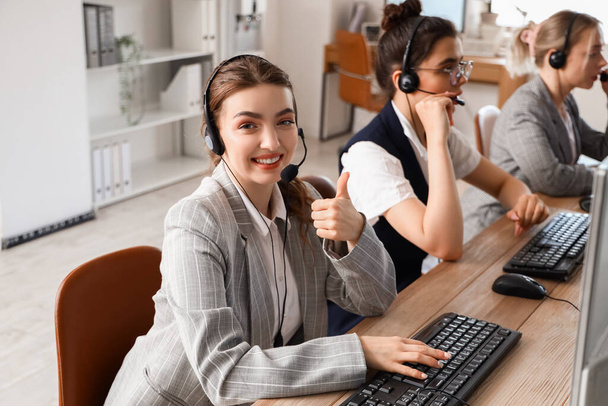 Female technical support agents working in office - Photo, Image