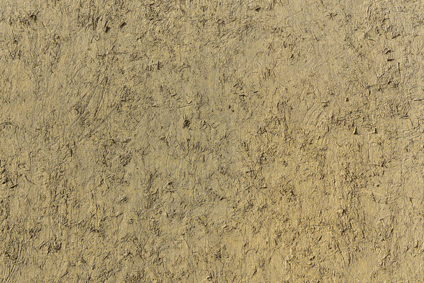 Texture of brown dry clay wall. Abstract background for design. - Photo, Image
