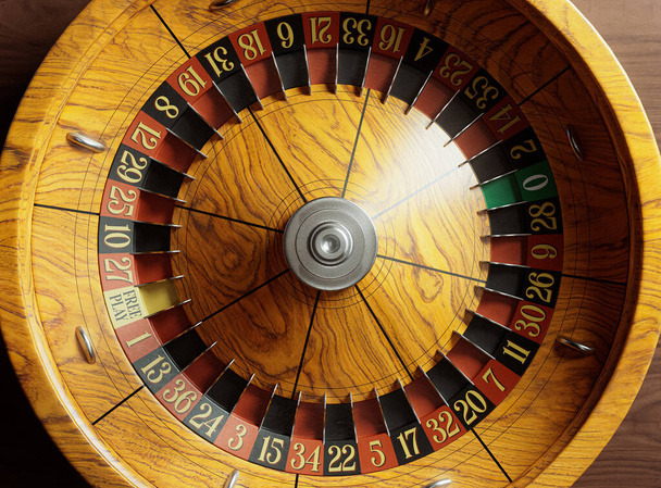 A closeup of a vintage antique roulette wheel with red and black markers with an ornate base on an isolated background - 3D render - Photo, Image