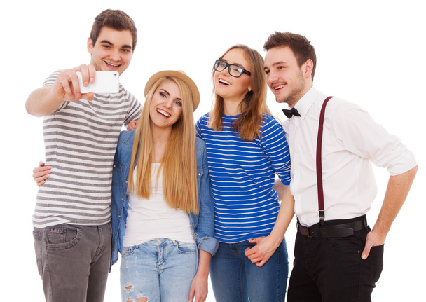 Four stylish young people on white background - Photo, Image