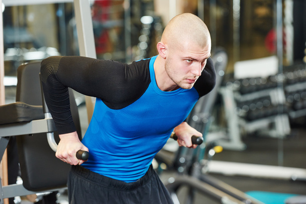 bodybuiler man at gym have a workout - Fotó, kép