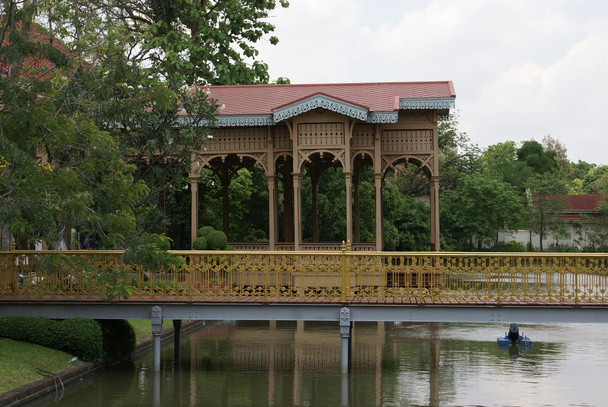 Pagoda & bridge over a lake in the garden of Vimanmek Mansion, Dusit Palace, Bangkok, Thailand - Photo, Image