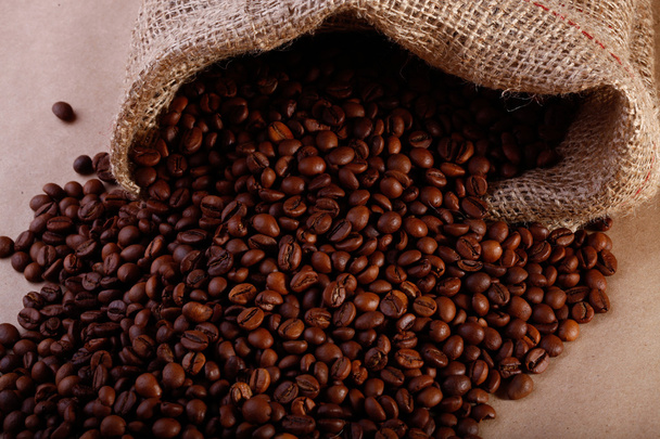 Coffee beans in a burlap bag - Valokuva, kuva