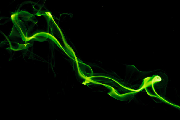 Green smoke on black background - Фото, изображение