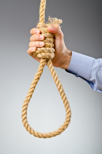 zakenman met zelfmoordgedachten - Foto, afbeelding