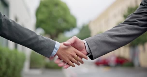 City, business and men with handshake, closeup and offer with partnership, welcome and thank you. Zoom, shaking hands and teamwork with agreement, collaboration and recruitment with a corporate deal. - Footage, Video