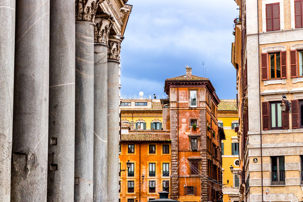 Windows of historical building and columns of Pantheon in Rome - 写真・画像