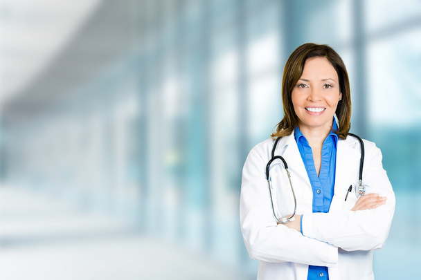 confident female doctor medical professional standing in hospital  - Zdjęcie, obraz