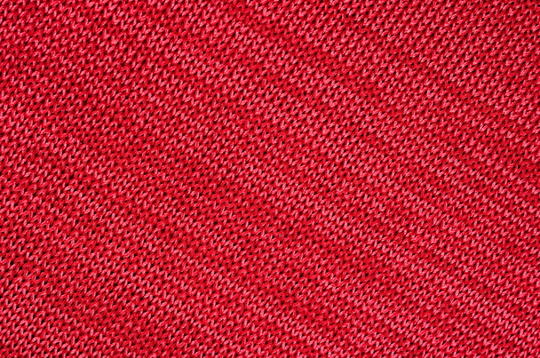 háttér piros kötött anyag ruhák varrására - Fotó, kép