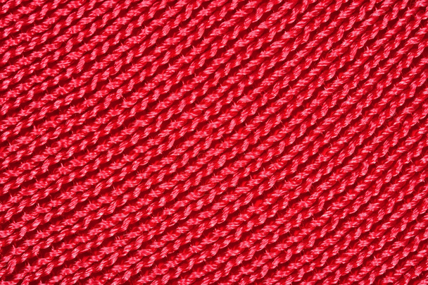 háttér piros kötött anyag ruhák varrására - Fotó, kép