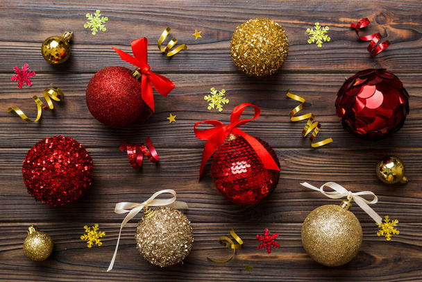Christmas ball on colored background. decoration bauble with ribbon bow with copy space. - 写真・画像