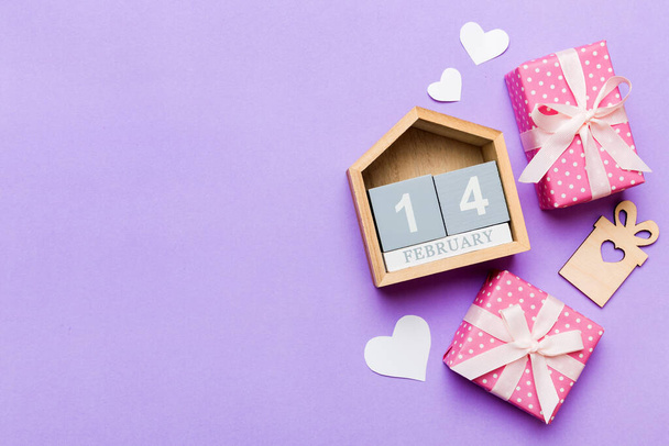Valentine Day theme with wooden block calendar. Greeting card template for Valentines Day.copy space for text. - Fotó, kép