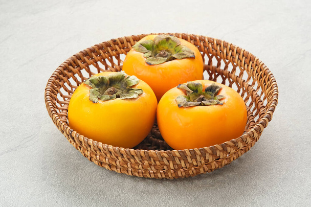 Fresh Ripe Persimmon or Kesemek fruit  - Photo, Image