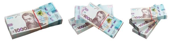 Bankpakete mit 1000 ukrainischen Griwna, isoliert auf weißem Hintergrund. - Foto, Bild