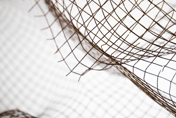 Close up Black Rustic Wire Mesh on White Background - Photo, Image