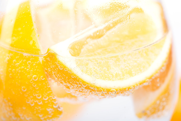 lemon in glass - Foto, afbeelding