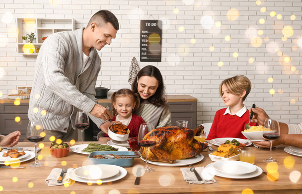 Happy family having dinner on Thanksgiving Day - Photo, Image