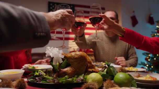 Family cheering and drinking wine to celebrate thanksgiving .  - Footage, Video