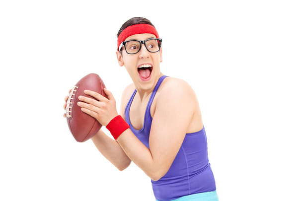 Young nerdy guy playing football - Foto, Imagem